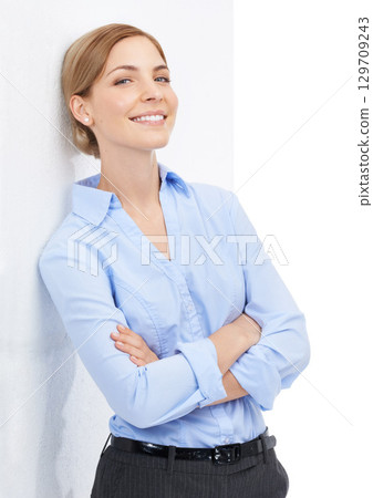 Business woman, happy portrait and arms crossed with a smile and pride for leadership and career choice. Entrepreneur in studio for startup success and happiness isolated on white background 129709243