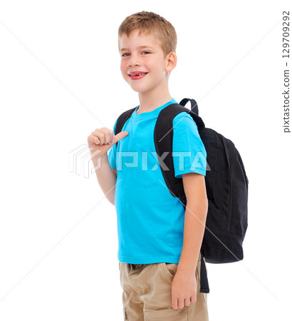 Backpack, happy and boy child in a studio with a casual, cool and natural outfit for back to school. Happiness, smile and portrait of a kid with a bag and stylish clothes isolated by white background Backpack, happy and boy child in a studio with a casual, cool and natural outfit for back to school. Happiness, smile and portrait of a kid with a bag and stylish clothes isolated by white background 129709292