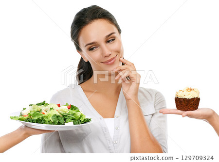 Woman with salad or cake choice isolated on white background and thinking of healthy food, diet or detox. Chocolate cupcake, green vegetable and model with offer, decision or idea in studio mockup 129709324