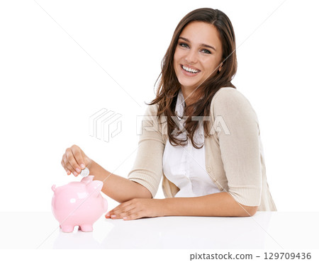 Money bank, savings and portrait of woman happy about saving, banking and investment for future. Female with a smile isolated on a white background for budget, security and coins in pig container Money bank, savings and portrait of woman happy about saving, banking and investment for future. Female with a smile isolated on a white background for budget, security and coins in pig container 129709436