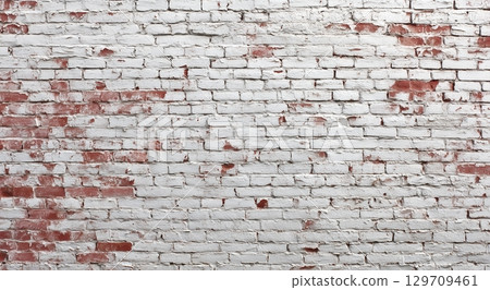 Brick wall with a red brick in the middle Brick wall with a red brick in the middle 129709461
