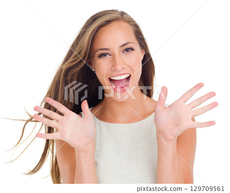Portrait, wow and a woman excited in studio isolated on a white background with a surprise hand gesture. Hands, motivation and winner with an attractive young female in celebration on blank space 129709561