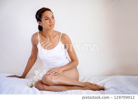 Lingerie, body and woman in bedroom for skincare, beauty and cosmetics marketing of natural shine and glow. Sexy woman relax, thinking of self care, self love and dermatology skin care on white wall Lingerie, body and woman in bedroom for skincare, beauty and cosmetics marketing of natural shine and glow. Sexy woman relax, thinking of self care, self love and dermatology skin care on white wall 129709912