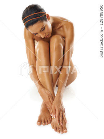 Above, self love and skincare woman with beauty from a spa, dermatology and cosmetics on a white background. Pedicure, skin care and model marketing luxury care of skin on a studio background 129709950