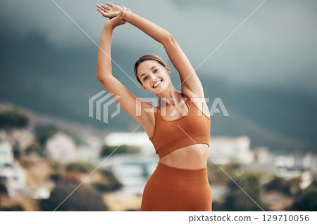 Fitness, stretching and portrait of woman in city for healthy lifestyle, wellness and exercise in nature. Sports, workout and happy girl stretch arms outdoors for cardio, yoga training and pilates Fitness, stretching and portrait of woman in city for healthy lifestyle, wellness and exercise in nature. Sports, workout and happy girl stretch arms outdoors for cardio, yoga training and pilates 129710056
