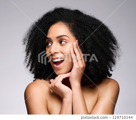 Face, beauty skincare and surprise of black woman in studio on a gray background. Makeup cosmetics, wow and thinking female model shocked with facial transformation after luxury spa skin treatment. Face, beauty skincare and surprise of black woman in studio on a gray background. Makeup cosmetics, wow and thinking female model shocked with facial transformation after luxury spa skin treatment. 129710144