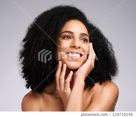 Black woman, beauty and skincare face portrait with a smile, glow and happiness for clean skin on studio background. Aesthetic model with afro hair and dermatology, cosmetic and makeup facial results Black woman, beauty and skincare face portrait with a smile, glow and happiness for clean skin on studio background. Aesthetic model with afro hair and dermatology, cosmetic and makeup facial results 129710148