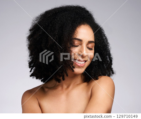 African hair, afro and face of model happy with spa salon hair care, clean hair growth or shampoo healthy hair. Luxury healthcare, dermatology and aesthetic black woman with skincare cosmetics makeup 129710149