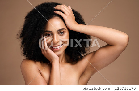 Beauty, skincare and product with portrait of black woman for facial, self care and luxury cosmetics. Spa, hair care and makeup with face of girl model for treatment, natural and wellness in studio 129710179