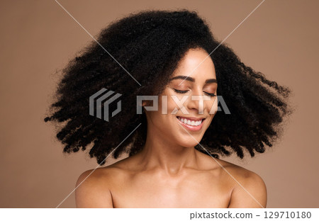 Shake hair, afro and face of black woman with clean shampoo hair care, luxury skincare cosmetics and natural facial makeup. Spa salon, trichology and happy African model with aesthetic healthy hair Shake hair, afro and face of black woman with clean shampoo hair care, luxury skincare cosmetics and natural facial makeup. Spa salon, trichology and happy African model with aesthetic healthy hair 129710180