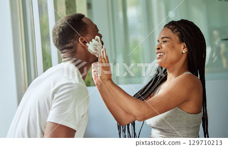 Skincare, happy couple in bathroom and shaving face with at home facial product for male facial treatment. Laughing together in home, natural beauty and girlfriend helping black man with application Skincare, happy couple in bathroom and shaving face with at home facial product for male facial treatment. Laughing together in home, natural beauty and girlfriend helping black man with application 129710213