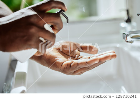 Black man, home bathroom or washing hands with soap for healthcare wellness, hygiene maintenance grooming or house self care. Zoom, cleaning product or sink tap skincare for bacteria safety routine Black man, home bathroom or washing hands with soap for healthcare wellness, hygiene maintenance grooming or house self care. Zoom, cleaning product or sink tap skincare for bacteria safety routine 129710241