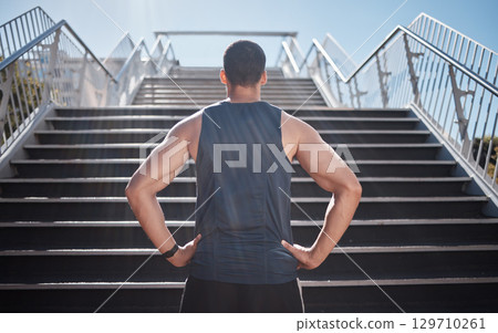 Fitness, man and stairs for sport in city for running, exercise or healthy cardio preparation. Muscular sporty male ready for training, workout or sports run for wellness by staircase in urban town Fitness, man and stairs for sport in city for running, exercise or healthy cardio preparation. Muscular sporty male ready for training, workout or sports run for wellness by staircase in urban town 129710261