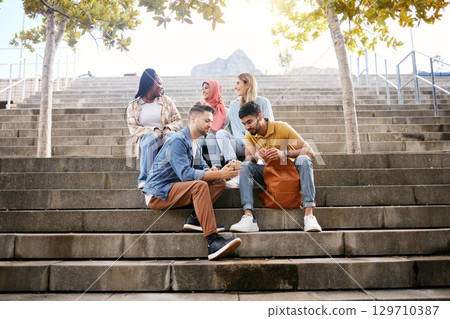 Relax, phone or students on steps at lunch break talking or speaking of future goals or education on campus. Social media, school or happy friends in university or college bonding in fun conversation Relax, phone or students on steps at lunch break talking or speaking of future goals or education on campus. Social media, school or happy friends in university or college bonding in fun conversation 129710387