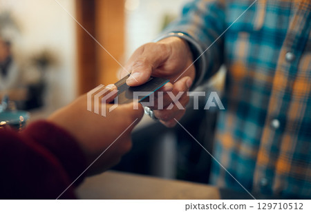 Credit card payment, giving or customer hands, store cashier or restaurant waiter exchange gift card. B2c shopping service, sales or black man with financial debit card for fintech pay at retail cafe Credit card payment, giving or customer hands, store cashier or restaurant waiter exchange gift card. B2c shopping service, sales or black man with financial debit card for fintech pay at retail cafe 129710512