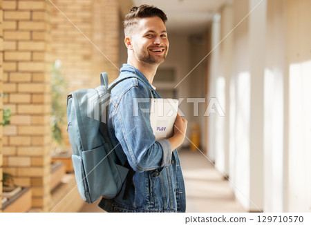 College education and student portrait with tablet for academic learning, research and studying online. Study, knowledge and Gen Z university man at campus on break in California, USA. 129710570
