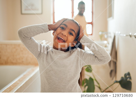Wellness, wow and portrait of girl in bathroom with father for morning routine, hygiene and cleaning. Black family, smile and face of young child for skincare, healthy lifestyle and self care at home Wellness, wow and portrait of girl in bathroom with father for morning routine, hygiene and cleaning. Black family, smile and face of young child for skincare, healthy lifestyle and self care at home 129710680