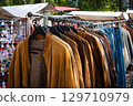 vintage leather jackets on second hand flea market , 129710979