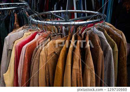 second hand leather jackets on vintage clothing flea market , 129710980