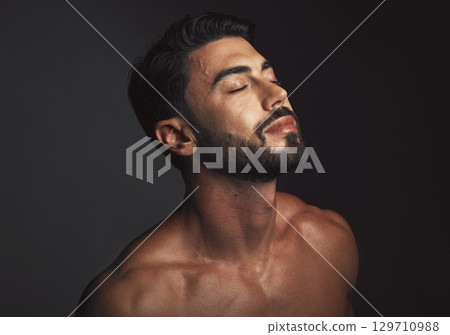 Skincare, face and man with beauty, dermatology and detox for wellness, luxury and cosmetics on studio background. Male, guy or natural body care for grooming, treatment or routine for organic facial Skincare, face and man with beauty, dermatology and detox for wellness, luxury and cosmetics on studio background. Male, guy or natural body care for grooming, treatment or routine for organic facial 129710988