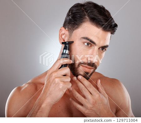 Man, shaving facial beard and razor hair removal, grooming hygiene cleaning or skincare dermatology wellness in grey studio background. Model, face beauty and shave for cosmetics self care cleaning 129711004