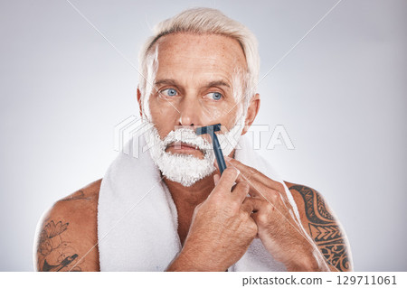 Man, face or shaving foam grooming in self love maintenance, beauty aesthetic or gray studio background. Zoom, mature or model and hair removal cream, facial razor cleaning or hygiene skincare growth 129711061
