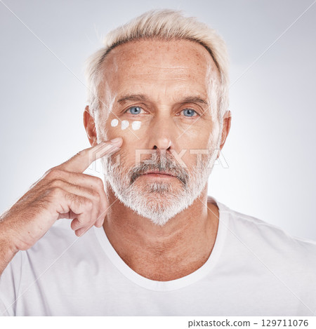 Skincare, cream and portrait of senior man on white background for beauty, wellness and dermatology. Cosmetics, grooming and elderly male with anti aging beauty products, facial treatment and lotion Skincare, cream and portrait of senior man on white background for beauty, wellness and dermatology. Cosmetics, grooming and elderly male with anti aging beauty products, facial treatment and lotion 129711076