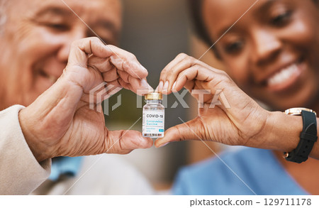 Covid vaccine, heart hands and nurse with patient in support of medical development, wellness medicine and vial bottle. Corona virus vaccination, healthcare and finger shape for hope, trust and risk Covid vaccine, heart hands and nurse with patient in support of medical development, wellness medicine and vial bottle. Corona virus vaccination, healthcare and finger shape for hope, trust and risk 129711178