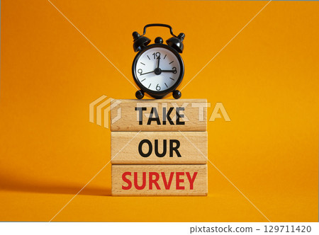 Take our Survey now symbol. Wooden blocks with words Take our Survey. Beautiful orange background with alarm clock. Business and Take our Survey concept. Copy space. Take our Survey now symbol. Wooden blocks with words Take our Survey. Beautiful orange background with alarm clock. Business and Take our Survey concept. Copy space. 129711420