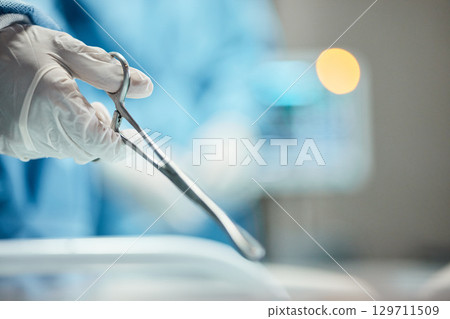 Hands, surgery or needle holder for stitches, surgical wound closure or thread control in life insurance operation. Zoom, surgeon gloves or medical metal tool in healthcare emergency room or theater Hands, surgery or needle holder for stitches, surgical wound closure or thread control in life insurance operation. Zoom, surgeon gloves or medical metal tool in healthcare emergency room or theater 129711509
