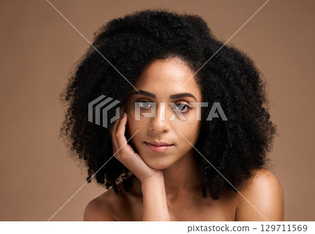 Black woman portrait, beauty and facial skincare with a natural glow and happiness for clean skin on studio background. Face of aesthetic model with afro hair and dermatology, cosmetics and makeup 129711569