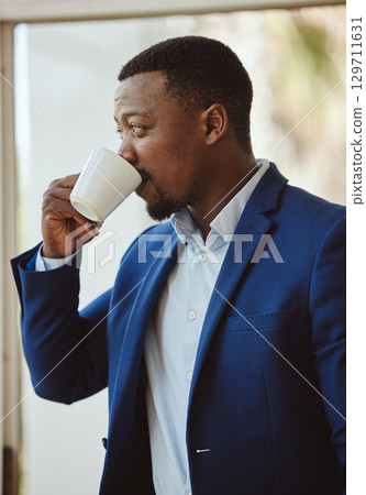 Thinking, black businessman or drinking coffee in airport lounge, hotel lobby or modern office building. Corporate worker, employee or manager with tea cup, innovation vision or company growth idea 129711631