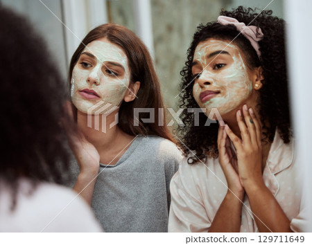 Women, home skincare or face mask bonding in house, bathroom or hotel for spa wellness, girls hospitality or healthcare grooming. Friends, people or beauty facial product for luxury wellness cleaning Women, home skincare or face mask bonding in house, bathroom or hotel for spa wellness, girls hospitality or healthcare grooming. Friends, people or beauty facial product for luxury wellness cleaning 129711649