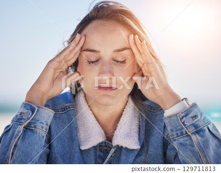 Thinking woman, stress face or anxiety by beach, ocean environment or sea nature in healthcare wellness meditation. Mental health, mind burnout or depression person with psychology crisis or headache Thinking woman, stress face or anxiety by beach, ocean environment or sea nature in healthcare wellness meditation. Mental health, mind burnout or depression person with psychology crisis or headache 129711813