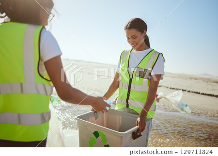 Garbage recycle, beach and eco friendly team and action for ocean waste. Pollution recycling, youth and cleaning ocean sea for environmental sustainability, volunteer teamwork and global ecology. 129711824