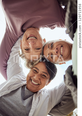 Fitness, portrait or senior friends with motivation, wellness goals or support in a group huddle for team building. Low angle, healthy or happy mature women in cardio workout, training or exercise 129711958