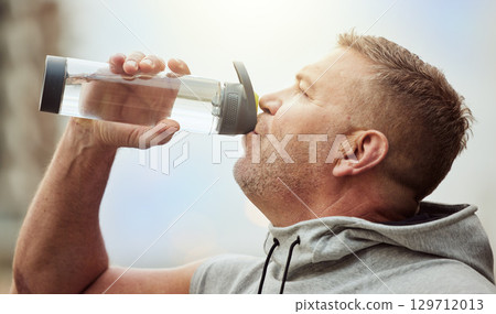 Fitness, runner or man drinking water with sports performance goals resting or relaxing on break. Healthy, tired or thirsty athlete drinks natural liquid in cardio workout, training or body exercise Fitness, runner or man drinking water with sports performance goals resting or relaxing on break. Healthy, tired or thirsty athlete drinks natural liquid in cardio workout, training or body exercise 129712013