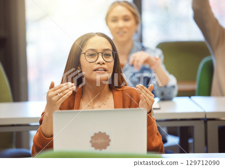 Business woman, laptop and audience opinion for idea at workshop training or seminar. Creative female employee with computer talking at convention for project plan or marketing startup at workplace 129712090