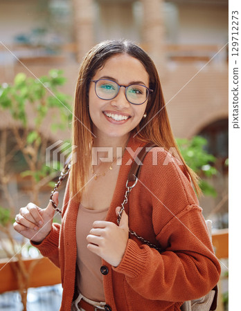 Smile, woman student and college with education portrait, happy with university and scholarship with learning and study. College student, freedom and academic growth, glasses and geek outdoor 129712273