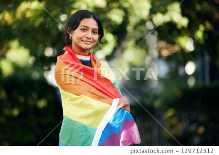 Portrait, woman and rainbow flag for pride, support and lgbtq awareness, sexuality freedom and queer. Female, girl and they with equality, love and gender neutral lifestyle for activism and festival 129712312