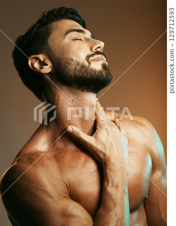 Man, body or hand touching muscles on studio background for training, exercise goals or workout aesthetic in physical wellness. Bodybuilder skin, fitness model or athlete person and self love goals Man, body or hand touching muscles on studio background for training, exercise goals or workout aesthetic in physical wellness. Bodybuilder skin, fitness model or athlete person and self love goals 129712593