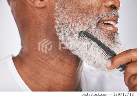 Elderly, black man with comb for beard, beauty and grooming closeup with face hygiene and cosmetic care profile. Hair care, brush body hair and treatment with cosmetics against studio background 129712718