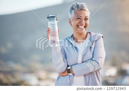 Fitness, happy or old woman with water bottle in nature to start training, exercise or hiking workout in New Zealand. Portrait, liquid or healthy senior person smiles with pride, goals or motivation 129712943
