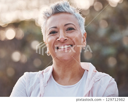 Nature, smile and happy senior woman outdoor for freedom, happiness and a healthy lifestyle with fitness and fresh air. Portrait of black female at park for peace, health and wellness in summer 129712982