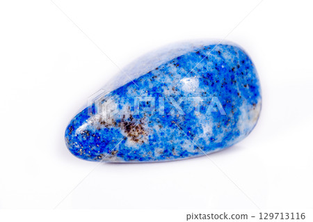 Macro mineral stone blue lapis lazuli (afghanistan) on white background 129713116