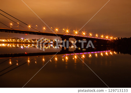 night city with reflection of houses in the river night city with reflection of houses in the river 129713133