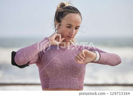 Young woman, fitness and heart rate on neck pulse for nature training. Sports runner, athlete and girl check smart watch, health progress or exercise time to monitor workout progress, energy and body Young woman, fitness and heart rate on neck pulse for nature training. Sports runner, athlete and girl check smart watch, health progress or exercise time to monitor workout progress, energy and body 129713164