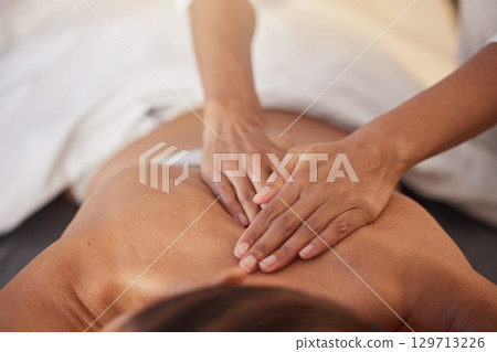 Woman at spa for massage with therapist and holistic treatment, wellness and self care with aromatherapy. Luxury service, health and peace with skincare to relax at salon, masseuse hands for zen. 129713226