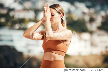 Beach meditation yoga, peace and woman meditate for chakra energy healing of soul, aura or spiritual balance. Zen freedom, pilates and girl relax for mental health, mindset wellness or mindfulness 129713258