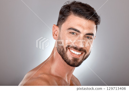 Beauty, skincare and portrait of man with smile on gray background studio for wellness, healthcare and hygiene. Cosmetics, grooming and face of male model for dentistry, body care and spa treatment Beauty, skincare and portrait of man with smile on gray background studio for wellness, healthcare and hygiene. Cosmetics, grooming and face of male model for dentistry, body care and spa treatment 129713406